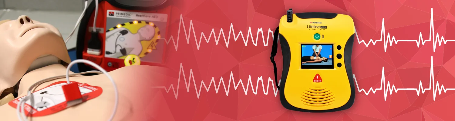 Banner AED über Herzausschlag, Übungspuppe